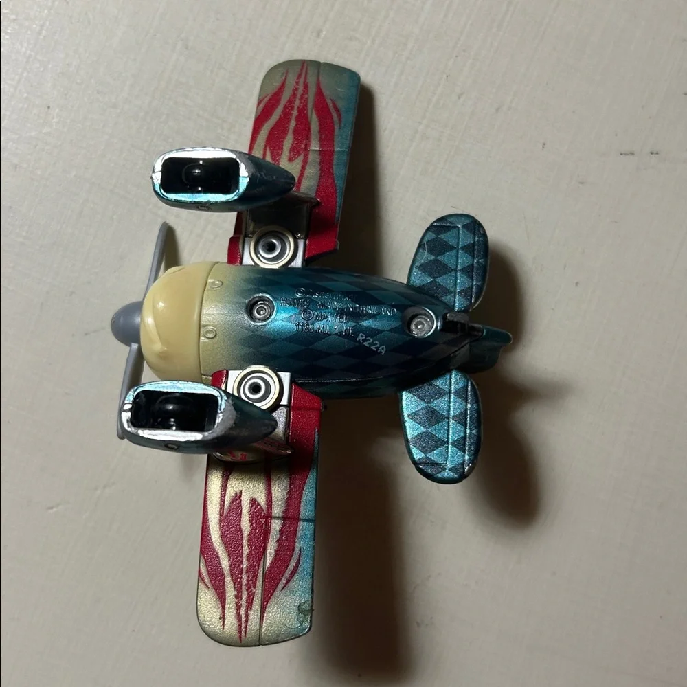 Disney Pixar Metallic Toy Airplane with Red Flames